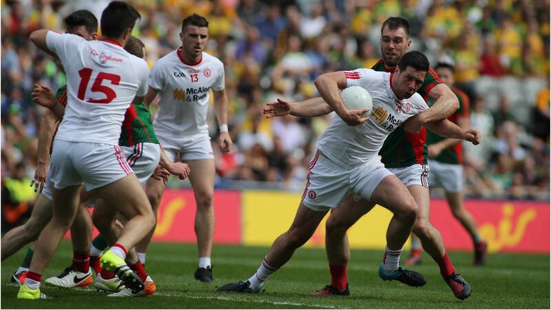 &nbsp;&nbsp;Mayo&rsquo;s Seamus O&rsquo;Shea adopts the hands-on approach with Sean Cavanagh during Saturday&rsquo;s All-Ireland SFC quarter-final<br />Picture by Hugh Russell