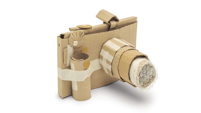Turn something as simple as cardboard and tape into creative role play items 