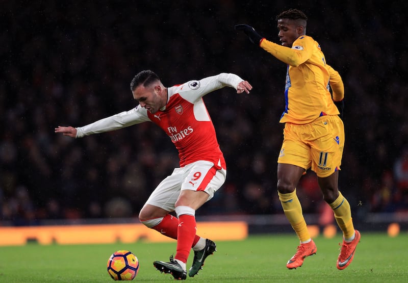 &nbsp;Arsenal's Martinez Lucas Perez Crystal Palace's Wilfried Zaha (right) battle for possession&nbsp;