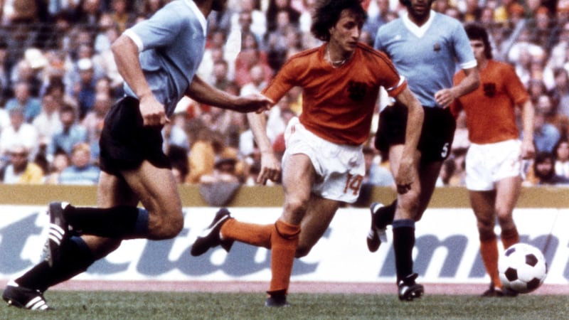 Dutch master Johan Cruyff creates alarm in the Uruguayan defence during this 1974 World Cup game in Hannover, Germany