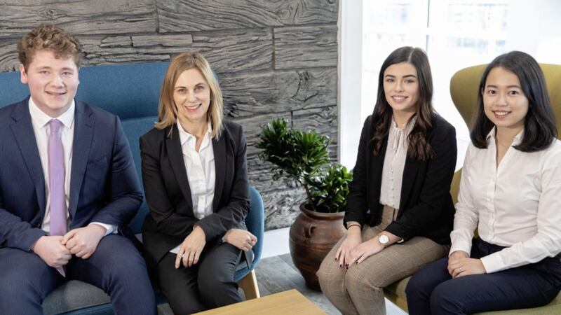 Angela Clist (second left), partner and head of Allen &amp; Overy&#39;s Legal Services Centre, welcomes graduates (from left) Danny Lyttle, Niamh Hutchinson and Lena Chua 