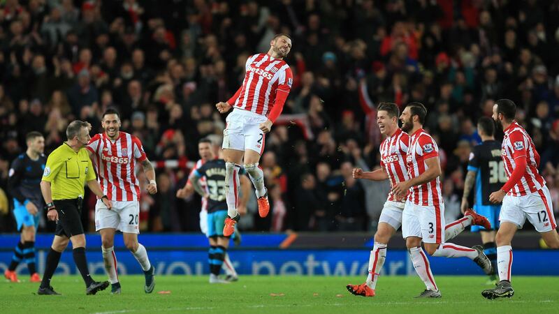 Stoke City's Phillip Bardsley (centre) celebrates with his team-mates after scoring his side's second goal during the Capital One Cup quarter-final against Sheffield Wednesday at the Britannia Stadium<br />Picture by PA