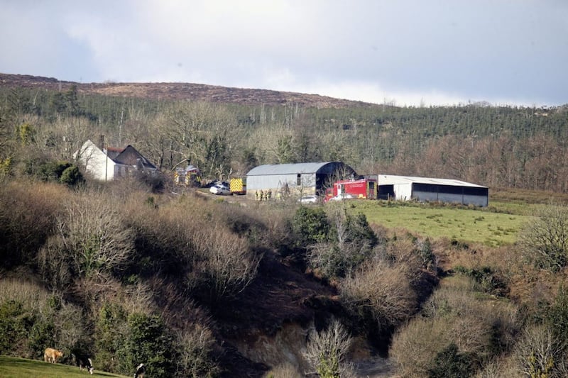 The scene of a fire near Derrylin where three people are dead and one man was arrested. Picture by Mal McCann