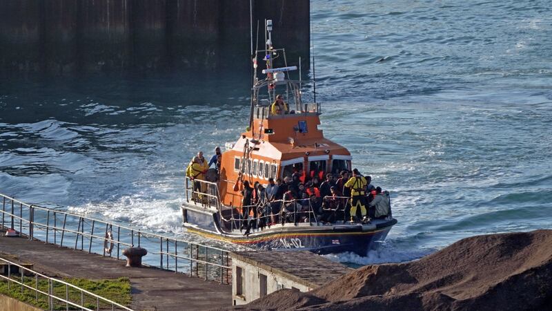 A group of people thought to be migrants are brought into Dover, Kent, onboard the Ramsgate Lifeboat following a small boat incident in the Channel (Gareth Fuller/PA)