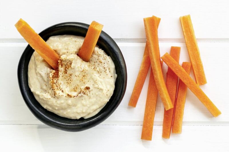 Houmous with carrot sticks, a good option for a healthy snack or supper