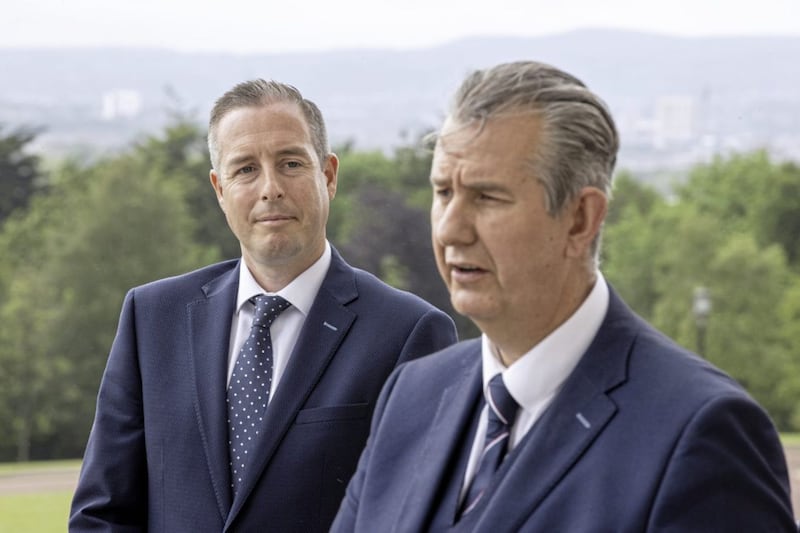 Former DUP leader Edwin Poots (right) during a press conference at Stormont with First Minister designate Paul Givan after announcing his first ministerial team 