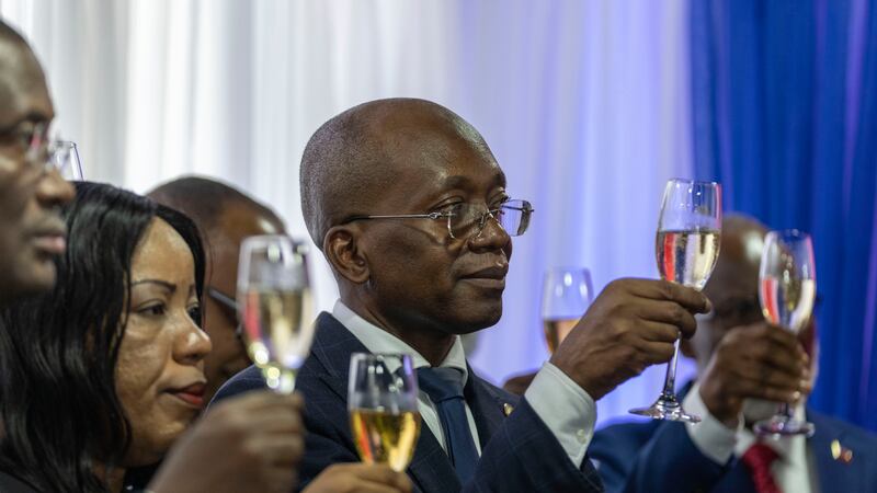Michel Patrick Boisvert, who was named interim prime minister by the cabinet of outgoing Prime Minister Ariel Henry, toasts during the swearing-in ceremony of the transitional council tasked with selecting Haiti’s new prime minister and cabinet (Ramon Espinosa/AP)