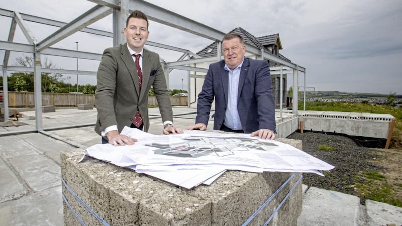 Perusing plans for the multi-million pound upgrade at The Salthouse eco hotel in Ballycastle are directors Carl McGarrity (left) and Nigel McGarrity 