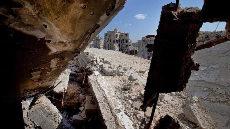 Destroyed buildings are seen in the old city of Homs, Syria. Picture by Hassan Ammar, Associated Press