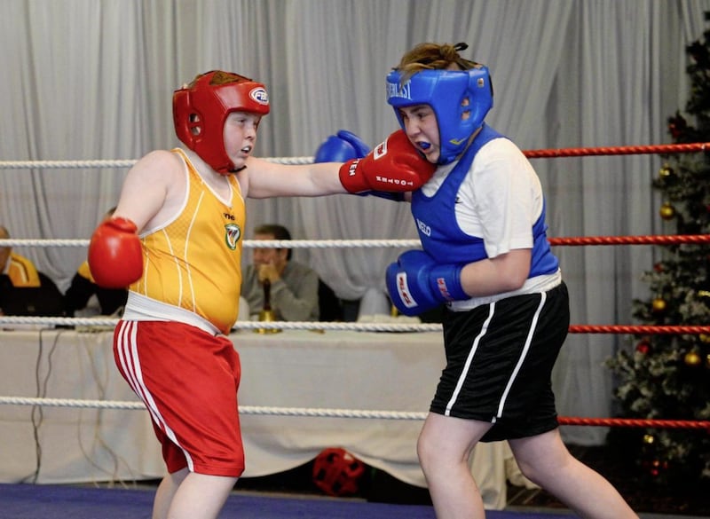 Leo Mulligan of St George&rsquo;s (red) and Eddie Ryan of Limerick put on a great display of boxing during their Boy 2 59kg bout at the Balmoral Hotel on Saturday. Mulligan claimed a 4-1 split decision win, but County Antrim were edged out, 12-8, on the night. Results as follows - B1 30kg: O Plachta bt N Bacon (Saints) 5-0; B1 35kg: I Almansori bt F McCullagh (McCullagh&rsquo;s) 5-0; B1 31 kg: C Killileagh (St Paul&rsquo;s) bt M Quilligan RSC3; B2 59kg: L Mulligan (St George&rsquo;s) bt E Ryan 4-1; B2 43kg: B Casey bt R Farrell (St Monica&rsquo;s) 5-0; B4 46kg: M Doherty (Holy Trinity) bt L Conors 5-0; B3 46kg: J Harty bt C O&rsquo;Neill (Star) 5-0; B3 44kg: T O&rsquo;Reilly bt J Doherty (Holy Trinity) 5-0; B3 35kg: B Walsh (Holy Family) bt T Casey 5-0; B3 53kg: P O&rsquo;Driscoll bt J Gray (Clonard) 5-0; B3 58kg: M Carmondy bt C Spence (Dockers) 4-1; B3 59kg: A McIvor (Oakleaf) bt L Fitzgerald 4-1; G2/3 52kg: N Mongans bt S Cowan (Evolution) 5-0; B3/4 41kg: P Ward (Immaculata) bt A O&rsquo;Donnell 5-0; B3/4: John R O&rsquo;Donnell bt G Brown (Emerald) 5-0; G4 52kg: R Lynch bt R Brown (Holy Trinity) 4-1; B5 49kg: D O&rsquo;Neill bt L Nelson (Lisburn) 3-2; B5/6 60kg: J O&rsquo;Donnell (St George&rsquo;s) bt John Ross O&rsquo;Donnell 3-2; B6 54kg: P Devine (Oliver Plunkett) bt L Price; Senior 75kg: S O&rsquo;Brien bt E Muhid (Dockers) 5-0 Picture by Mark Marlow 