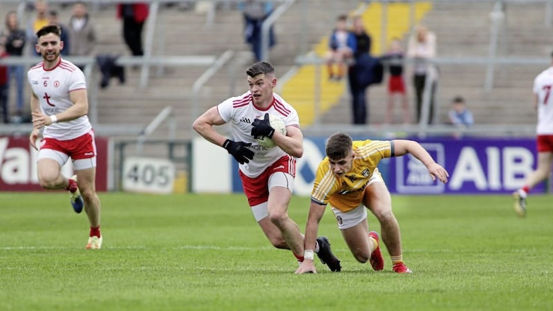 Tyrone&#39;s Richie Donnelly in action against Antrim&#39;s James McAuley in this year&#39;s Ulster Championship. McAuley is confident the Saffrons can start climbing the Leagues Picture: Seamus Loughran 