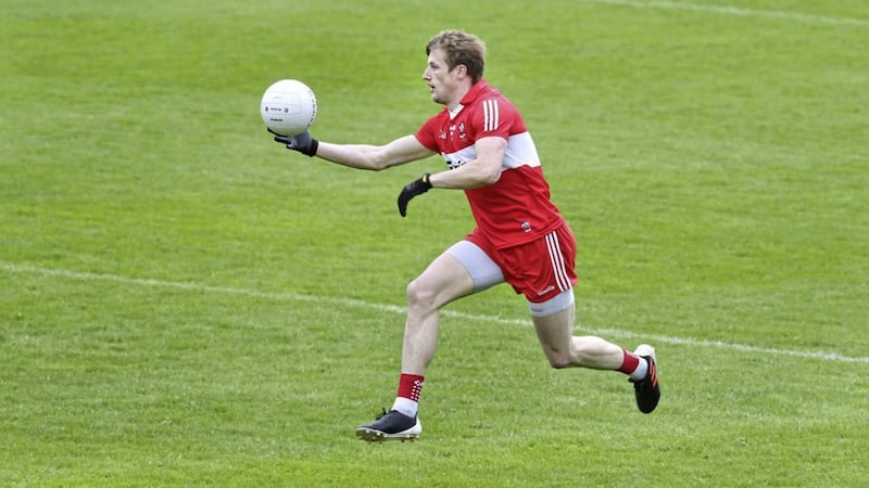 Derry's Brendan Rogers in full flight against Donegal during the Ulster SFC Final at Clones; he was named Pwc GAA/GPA Footballer of the Month for May.<br />Picture Margaret McLaughlin