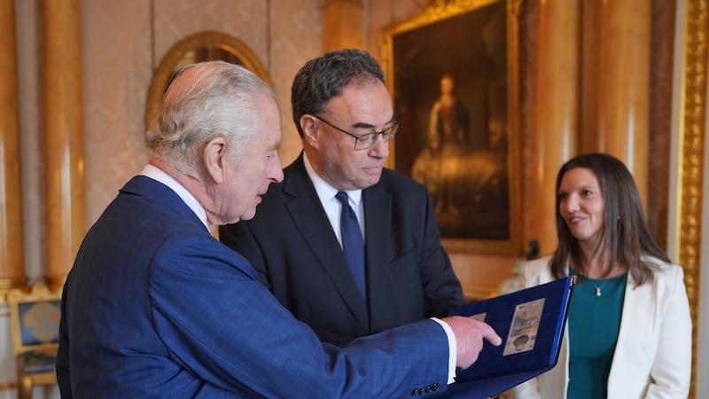 The King has been presented with the first banknotes bearing his portrait by the Governor and Chief Cashier of the Bank of England at Buckingham Palace