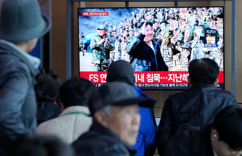 A TV screen shows an image of North Korean leader Kim Jong Un during a news programme at the Seoul Railway Station in Seoul (Ahn Young-joon/AP)