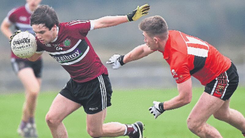 Corey Quinn of St Mary&rsquo;s tries to get away from UCC&rsquo;s Kevin Flahive yesterday&rsquo;s Sigerson Cup semi-final in Mayo.&nbsp;Picture by Sportsfile&nbsp;