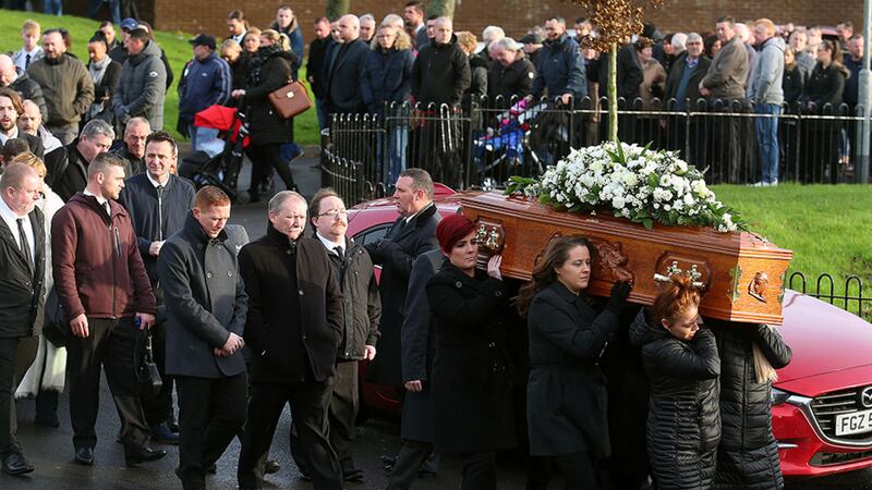 The funeral of Margaret McAlorum leaves her home in west Belfast to St Oliver Plunkett in Lenadoon Picture Mal McCann &nbsp;