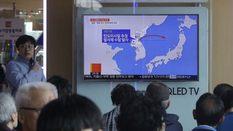 People sit in front of a TV screen showing a news programme reporting about North Korea's missile firing, at Seoul Railway Station in Seoul, South Korea, Thursday, June 8, 2017. North Korea fired several projectiles believed to be short-range surface-to-ship cruise missiles off its east coast Thursday, South Korea's military said, a continuation of weapons tests that have rattled Washington and the North's neighbors as Pyongyang seeks to build a nuclear missile capable of reaching the continental United States. The sign read: &quot;North Korea fired missiles.&quot; Picture by Ahn Young-joon, Associated Press&nbsp;