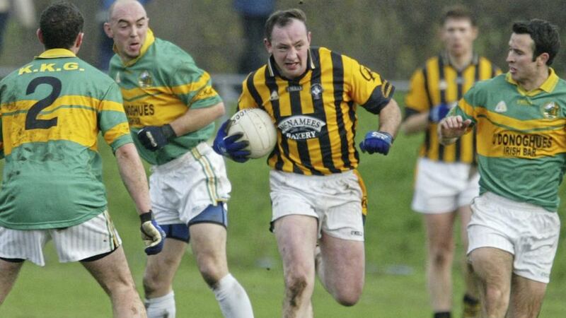 Crossmaglen&rsquo;s John Donaldson takes on the Kingdom Kerry Gaels defence during the 2004 All-Ireland Club SFC quarter-final at Ruislip