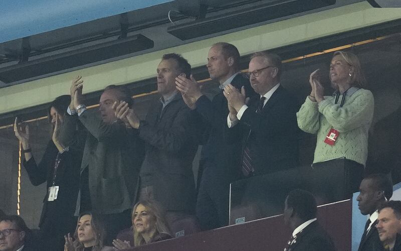 The Prince of Wales applauds in the stands