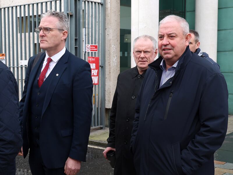 The family of  Sean Brown leave the High Court in Belfast after the inquest into his murder was halted. The coroner is to write to 
the Secretary of State Chris Heaton Harris requesting a public inquiry into the murder of the GAA official by loyalists in 1997, after stating his inquest cannot continue due to material being withheld on grounds of national security. PICTURE: Mal McCann