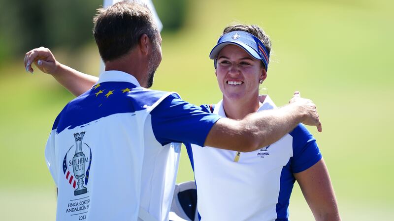 Europe’s Linn Grant celebrates with her caddie after winning her foursomes match with Maja Stark on day two of the 2023 Solheim Cup (John Walton/PA)