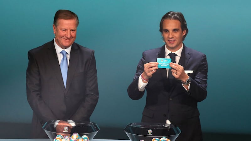 Nino Gomes (right) draws Republic of Ireland into Group D, stood alongside Ronnie Whelan during the Euro 2020 European qualifier draw at the Convention Centre, Dublin on Sunday December 2 2018. <br />Picture by Brian Lawless/PA Wire
