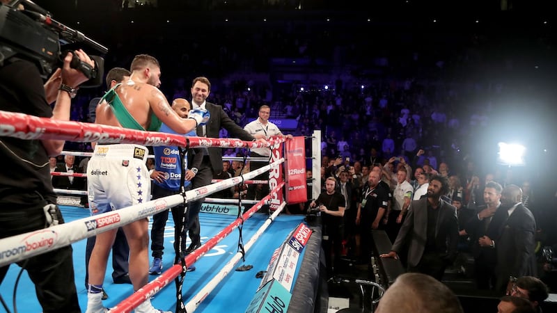Tony Bellew has a heated exchange with David Haye (right) after his victory over BJ Flores for the WBC World cruiserweight title at the Echo Arena, Liverpool on Saturday night<br />Picture by PA&nbsp;