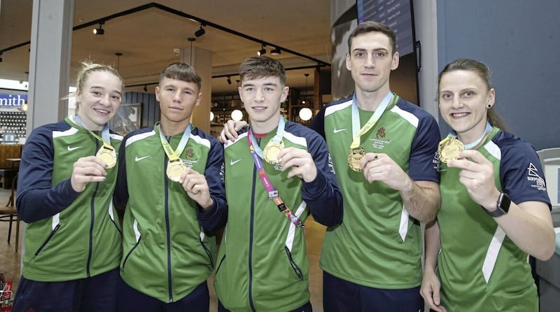 Commonwealth Games gold medallists (from left) Amy Broadhurst, Dylan Eagleson, Jude Gallagher, Aidan Walsh and Michaela Walsh after arriving back in Belfast. Picture by Hugh Russell 