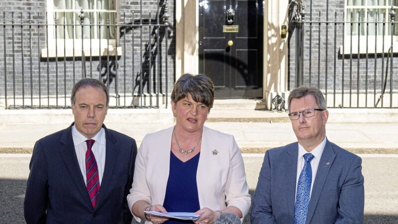 Sir Jeffrey Donaldson with party leader Arlene Foster and deputy leader Nigel Dodds outside 10 Downing Street last month. Picture by Dominic Lipinski/PA Wire 