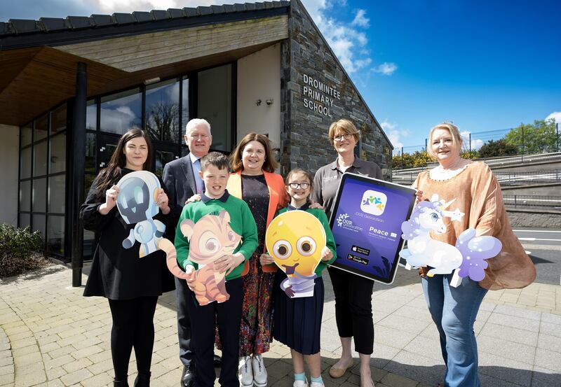 Dr Tara O'Neill, Ulster University, David Babington, Action Mental Health, Wendy McKeown, Principal of Dromintee, Dr Colette Ramsey, Ulster University, Carol Scullion, OUR Generation, with pupils Andrew McNally and Layla Briggs