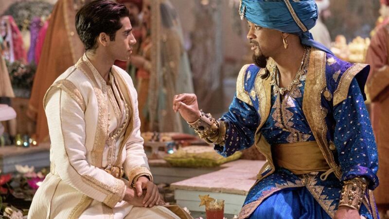 Mena Massoud as Aladdin and Will Smith as Genie 