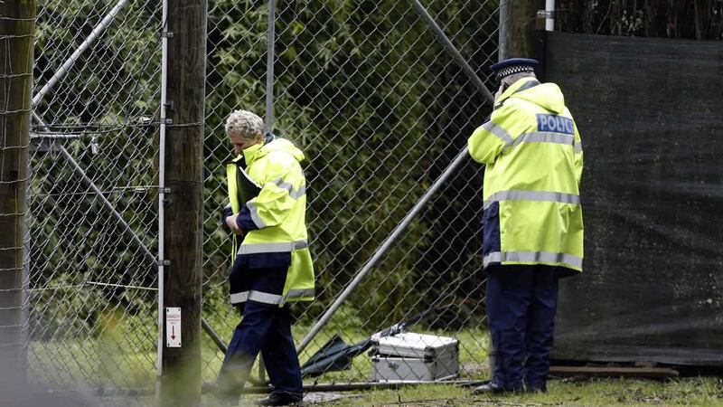 Police stand near shut gates at New Zealand's Hamilton Zoo