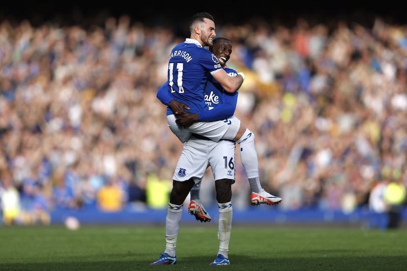 Everton winger Jack Harrison is lifted up by Everton team-mate Abdoulaye Doucoure