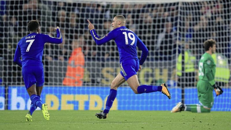 Leicester City's Islam Slimani wheels away after scoring his side's decisive second goal against Liverpool