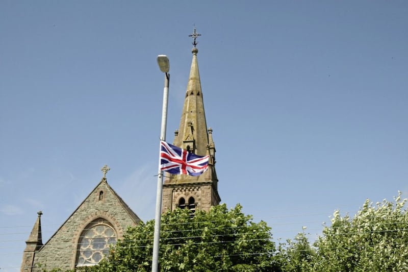 A Union flag flying outside Sacred Heart Catholic Church in Dundrum, Co Down. File picture by Bill Smyth 