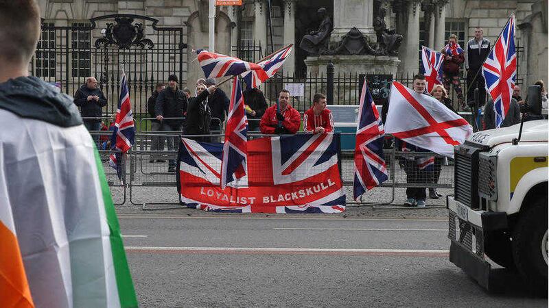 The scene outside Belfast City Hall during a loyalist flag protest on St Patrick&#39;s Day last March. Picture by Hugh Russell 
