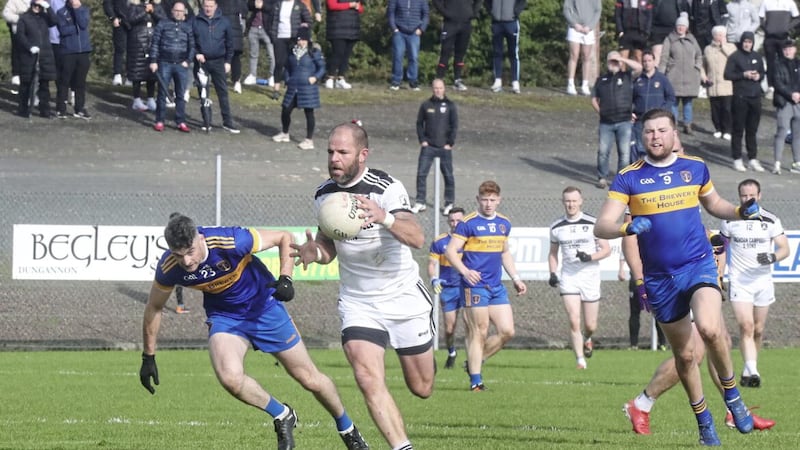 Clonoe defied four dismissals to hold on and see of Donaghmore in their Tyrone SFC quarter-final     Picture: Jim Dunne