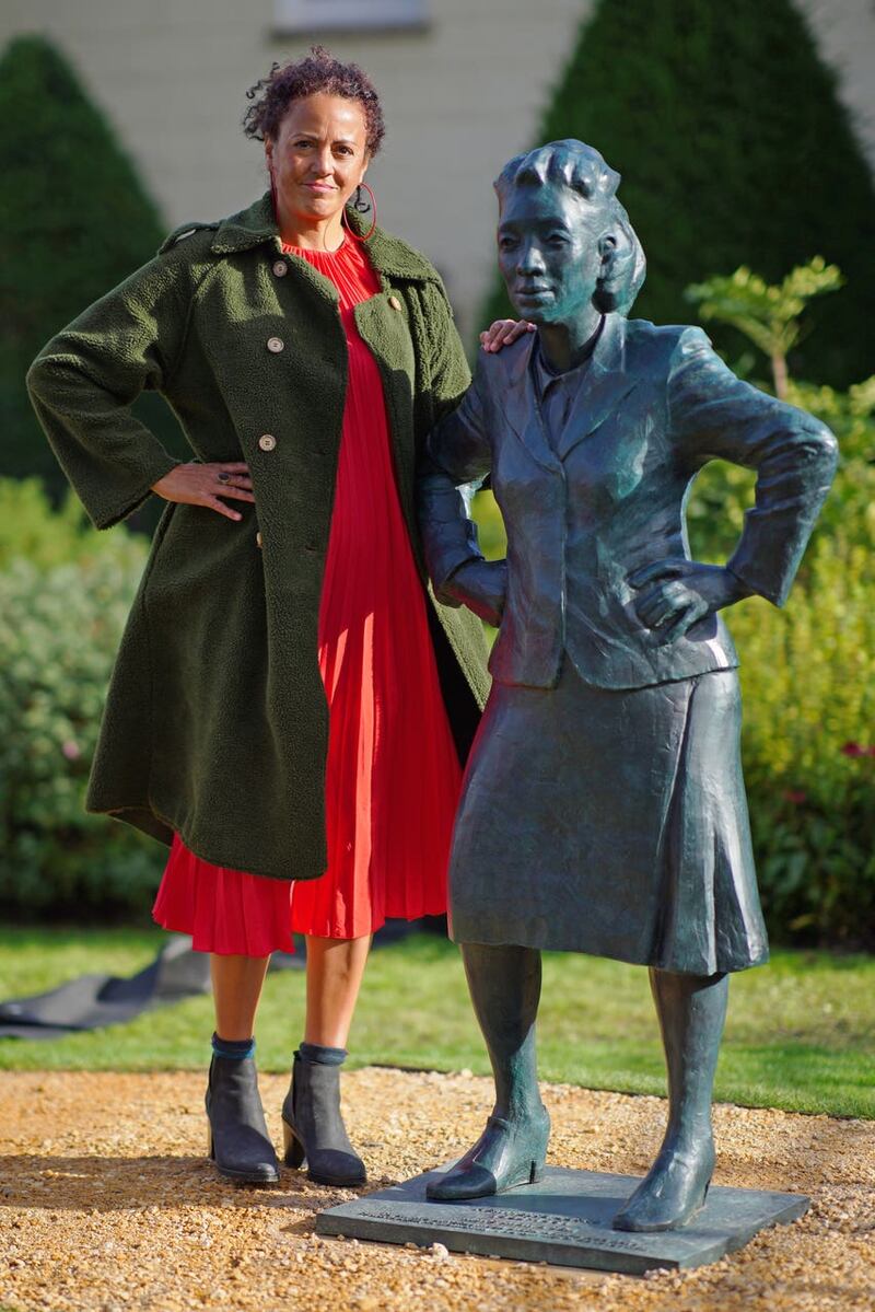 Bristol-born artist Helen Wilson-Roe with her statue of Henrietta Lacks (Ben Birchall/PA)