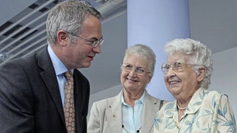 Ellen Lawther pictured at the age of 101 with her daughter, Margaret and then Social Development Minister Alex Attwood at the Waterfront Hall 