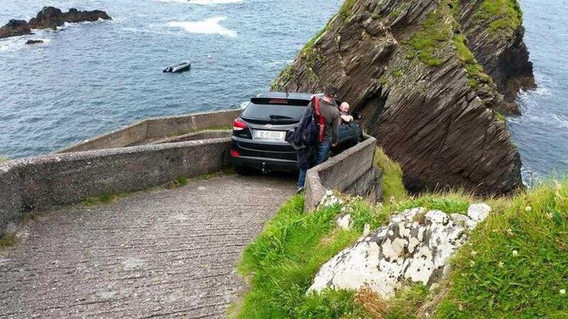 A man spent more than 12 hours in his car after getting it stuck on a pedestrian-only walkway in Co Kerry. Picture by Blasket Island Ferries 
