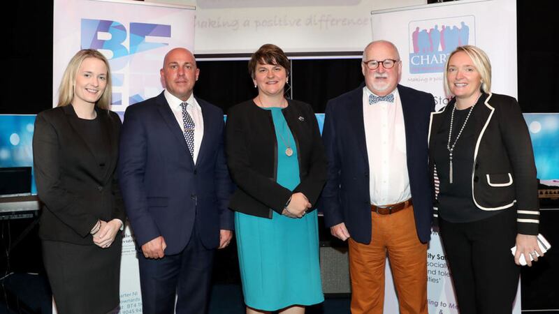 DUP councillor Sharon Skillen, loyalist leader Dee Stitt, First Minister Arlene Foster, chairperson of Charter NI Drew Haire and project manager Caroline Birch. 