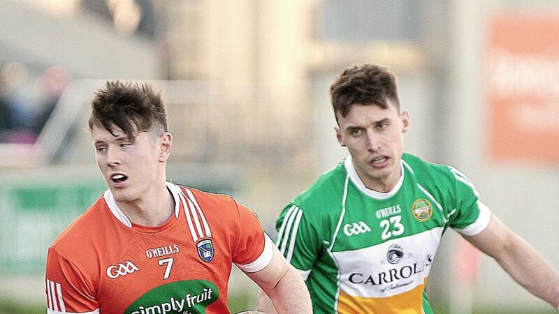 Armagh&rsquo;s Joe McElroy gets away from Sean Doyle of Offaly during yesterday&rsquo;s Division Three clash in Tullamore Picture by Robert Smith 