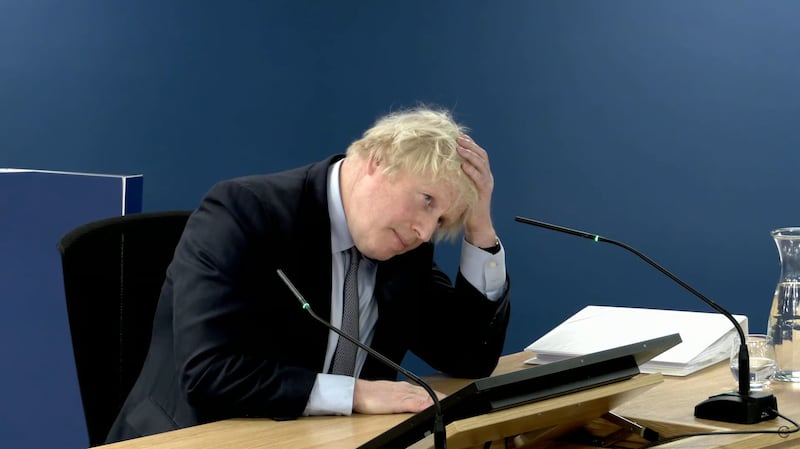 Boris Johnson appeared emotional as he  described the ‘tragic, tragic year’ of 2020. Picture by Press Association