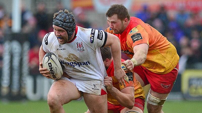 Ulster's Johnny Murphy and is pulled back by Scarlets' Margan Allen during Sunday's PRO12 game at Ravenhill<br/>Picture by Pacemaker&nbsp;&nbsp;