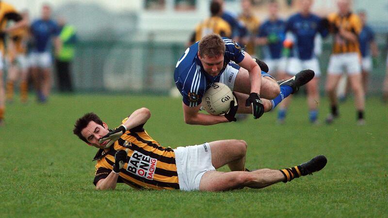 St Gall's ace Kevin McGourty takes to the air after this collision with Crossmaglen's Aaron Kernan in an Ulster Club clash at Oliver Plunkett Park. Twenty years ago, a young McGourty was in goalscoring form for La Salle, Belfast in the Mageean Cup. Picture by Seamus Loughran &nbsp;
