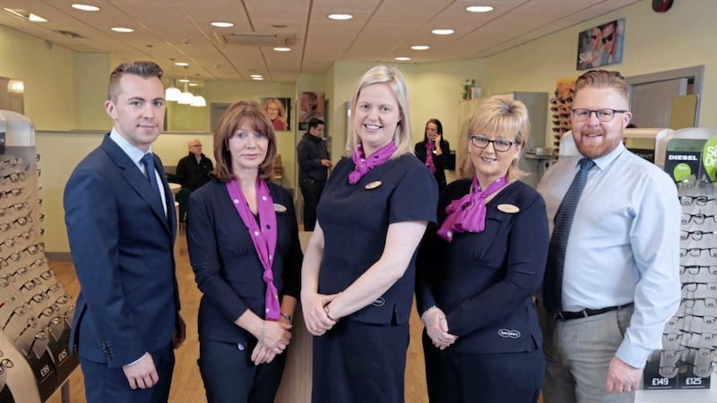 Specsavers Derry store directors Daibheid McHugh (left), Sean McCauley (right) and Maeve Walsh (centre) pictured with store manager Michelle Doherty (second left) and office manager Louise Doherty (second right). 