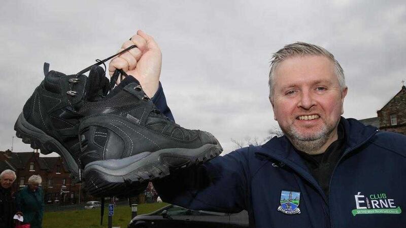 Fr Gary Donegan gets his hiking boots out ahead of his trek of Croagh Patrick<br />Picture by Hugh Russell