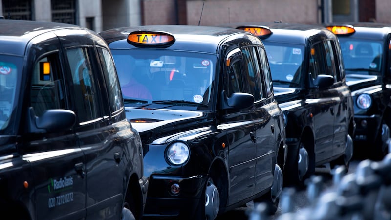 People in London will be able to order black cabs through Uber from early next year, the app company has announced (Alamy/PA)