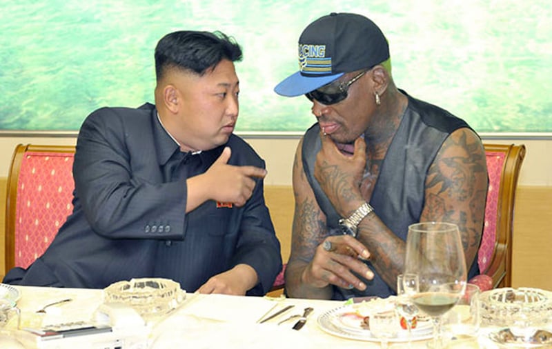 In this undated photo published on Sept. 7, 2013, on the homepage of North Korea's Rodong Sinmun newspaper, North Korean leader Kim Jong Un, left, talks with former NBA player Dennis Rodman during a dinner in North Korea&nbsp;