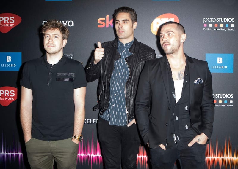 James Bourne, Charlie Simpson and Matt Willis of Busted (Danny Lawson/PA)